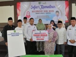 Bupati Kasmarni Serahkan Perangkat MOLDUK Portable di Kecamatan Siak Kecil 